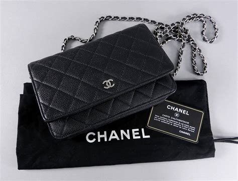 chanel black quilted bag silver chain|chanel wallet on chain size.